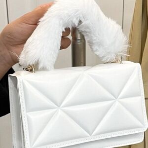 Elegant White Quilted Handbag with Faux Fur Handle